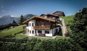  Chalet an der Piste  Капрун